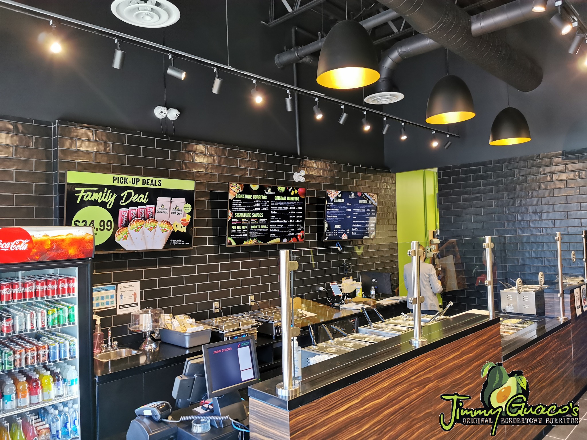 Jimmy Guaco's restaurant counter and in-store menu displays