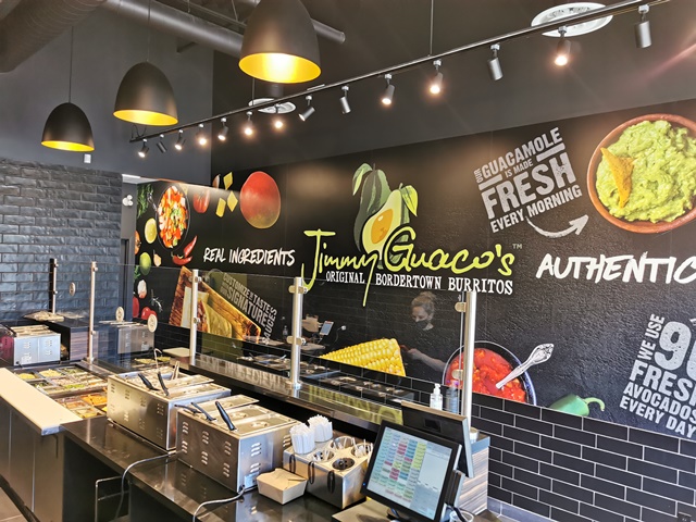 Jimmy Guaco's branded feature wall in the completed restaurant