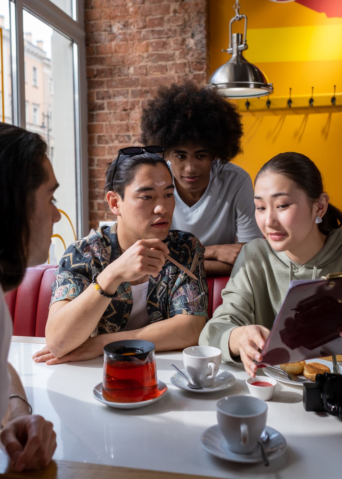 Diverse group discussing a business plan